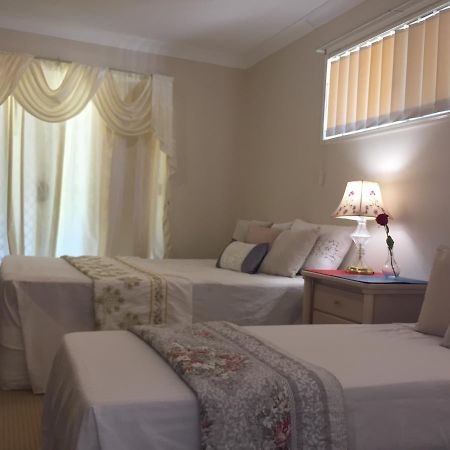 Theme Parks Amituofo Homestay Gold Coast Zimmer foto