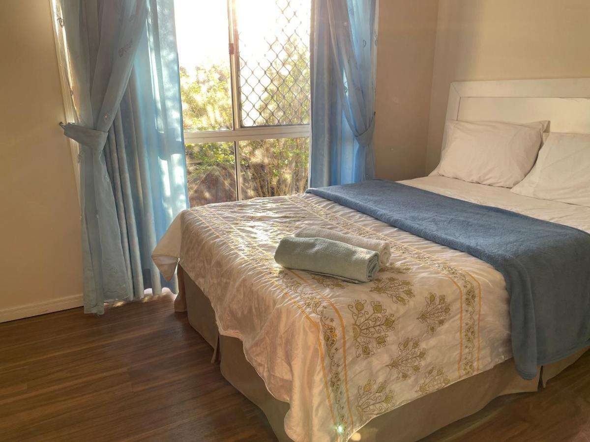 Theme Parks Amituofo Homestay Gold Coast Exterior foto